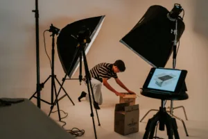 studio shot of a man unboxing a package