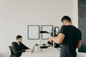 man in black crew neck t shirt standing in front of man in black t shirt